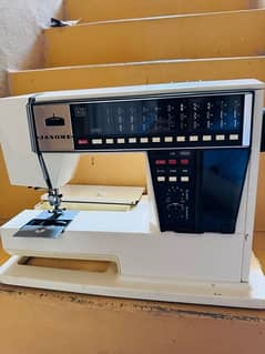 janome 5002 ( with free hp printer )