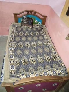 single bed wooden with mattress