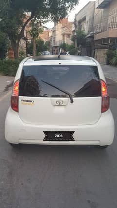 Toyota Passo 2006 pearl white.