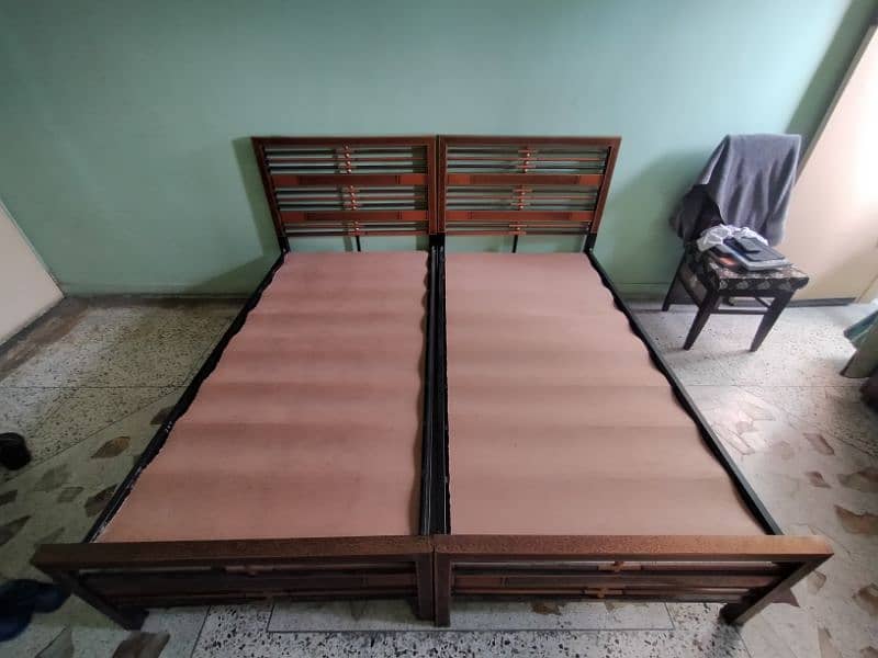3 Single Iron Beds 1