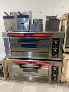 Used hood with pizza oven workin tables