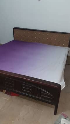 selling my bed with cushioned back with mattress in good condition