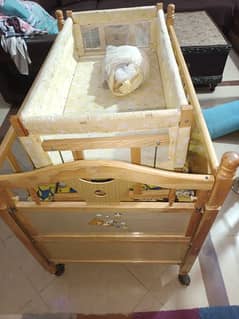 Baby  cot bed and jhola.