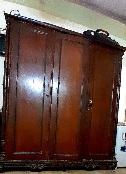 3 doors wooden cupboard 0