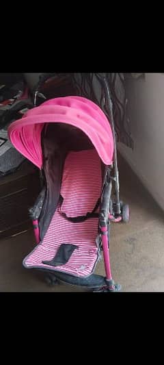 single pram and baby  cot