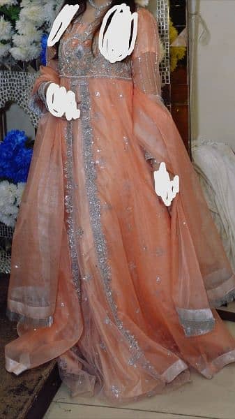 Peach color Gorgeous Front open Maxi for party wear. 0