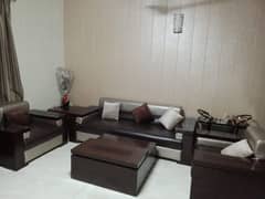 2 Leather poshish  sofa set with 2 tables. 1set with table Rs 65k