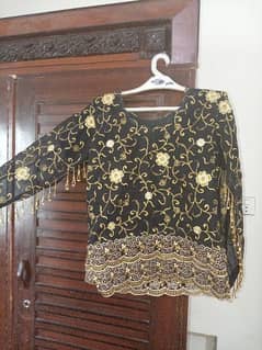 stitch black saree with golden work
