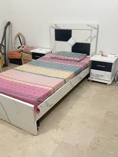 single bed set with medicated mattress and two sidetables