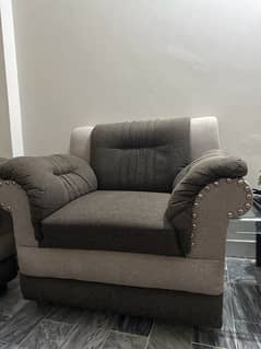 used 5 seater sofa set for sale in grey colour with minor defect