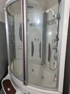 shower cabin with bathtube, hot steamer and jacuzzi.