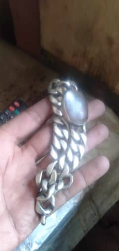 Fully Silver(chandi) hand bracelet with oval shaped Noor e Najaf stone