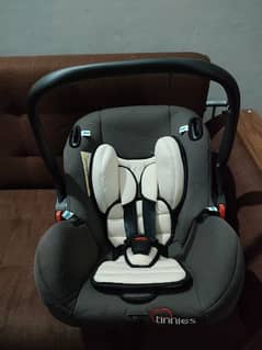 tinnies Baby car seat carrycot