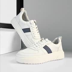 White Sneakers with Blue Stripe