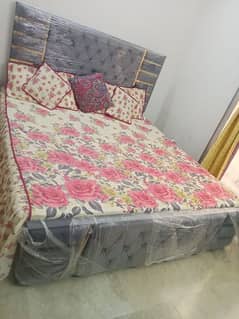 Double bed with dressing and side tables