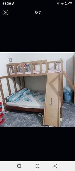 woodden bunk bed with double stories.