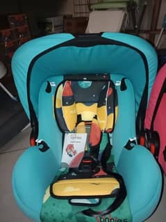 Tinnies Baby Cot Or Car Seat in 10/10 condition
