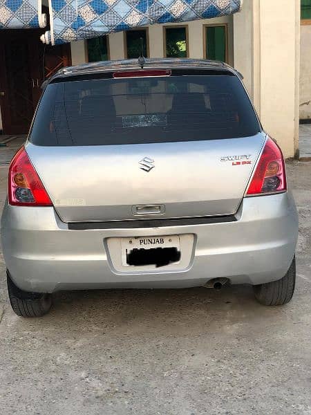 Suzuki Swift DX 2013 1