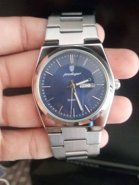 original poedagar watch  . full stainless steel, blue dial 1