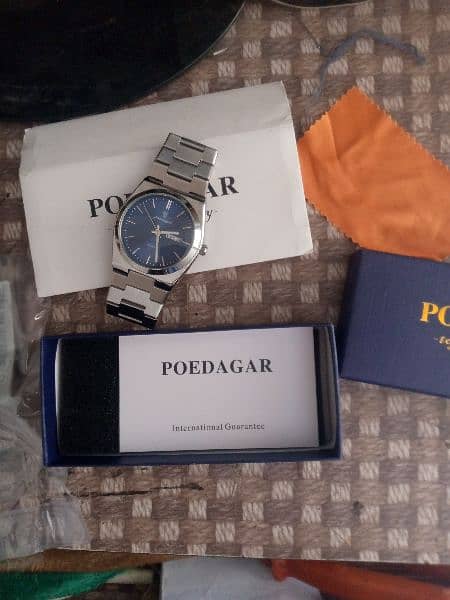 original poedagar watch  . full stainless steel, blue dial 6