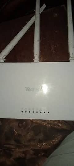 Tenda modem used butt god condition hai chalta hai