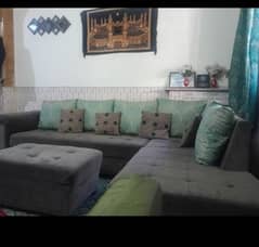 L Shaped Sofa in Excellent condition with Cushions
