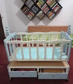 baby cot and swing