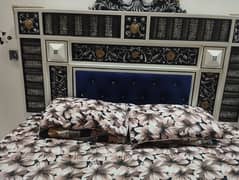 king size bed along with side table and dressing 0