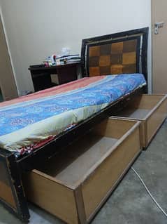 Single bed with mattress and two drawers