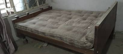 wooden double bed