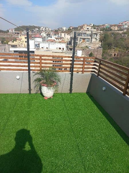 artificial grass, media wall, ceiling, office decore, beauty parker 2