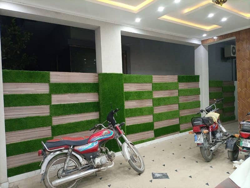 artificial grass, media wall, ceiling, office decore, beauty parker 8