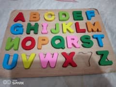 wooden English alphabets with wooden board 0