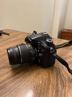 Nikon D7100 with 55-300 lens. Barely used in New condition