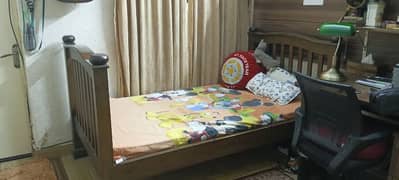 Single Bed Standard size Wooden With mattress (negotiable)