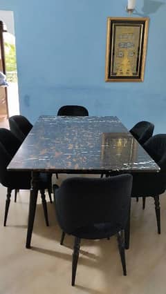 6 chairs dining table with marble top slightly used