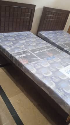 Iron Double bed mattress / 2 wooden single bed matres / 2 center table