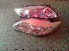 toyota corolla 2010 headlight/brakelight set available