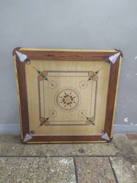 Carrom board in good condition 12