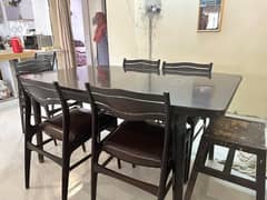 wooden dining table with 6 chairs