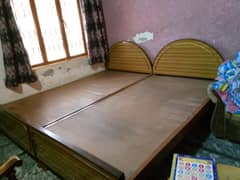 2 wooden bed with matrix