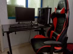 HEAVY GAMING SETUP WITH GAMING CHAIR AND TABLE