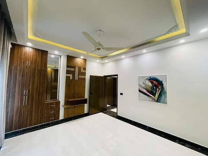A block 10 Marla New brand house available for sale 80 feet Road par 11