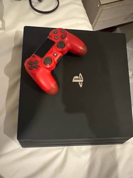 playstation 4 pro 1 TB plus controller 0