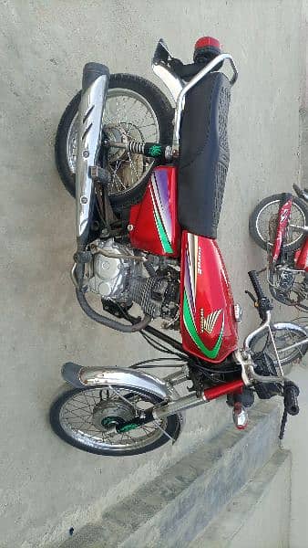 Honda cg 125 Islamabad number golden number biometric available 2