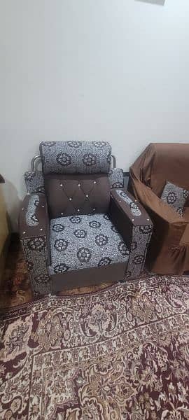 5 seater sofa set slightly used wooden with cover on it 1