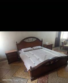 bed for sale in good condition with 2 side tables in normal condition
