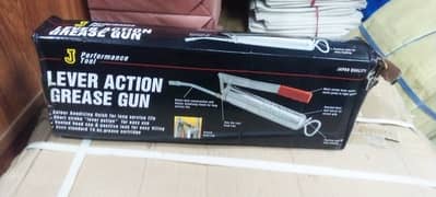Grease gun for greasing the vehicles and machines