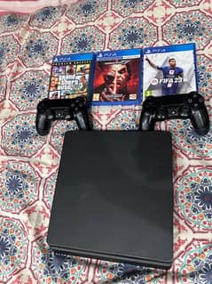 Playstation 4 slim 500gb + 2 controllers and games