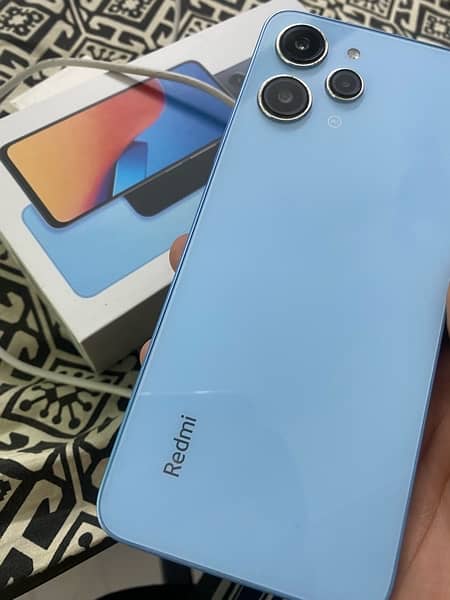 REDMI 12 10/10 128GB WITH BOX AND ORIGINAL CHARGER 1
